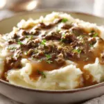 hamburger gravy over mashed potatoes - featured image
